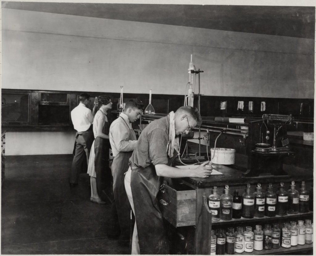 historic photo of students in a lab