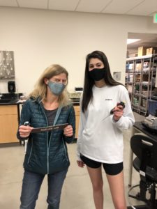  Priya standing with Professor Rachel Mueller in the Mueller Lab.