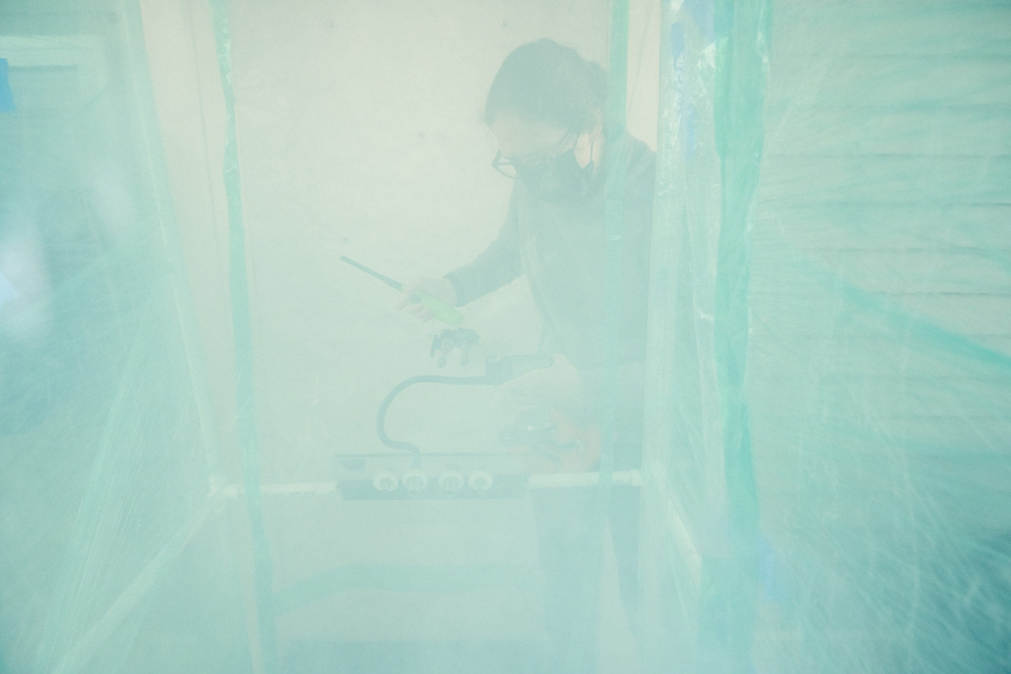 Researcher working on smoke chamber