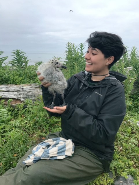 Mel holding a bird