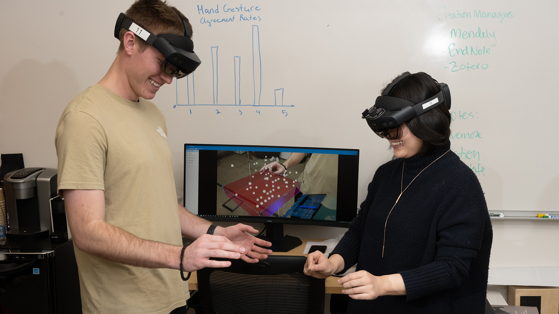 students in lab using virtual reality headsets