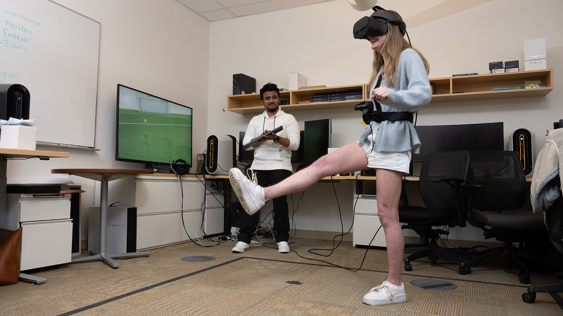students demonstrate soccer experiment with virtual reality headset