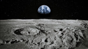 Photo of the surface of the moon with Earth in the background.